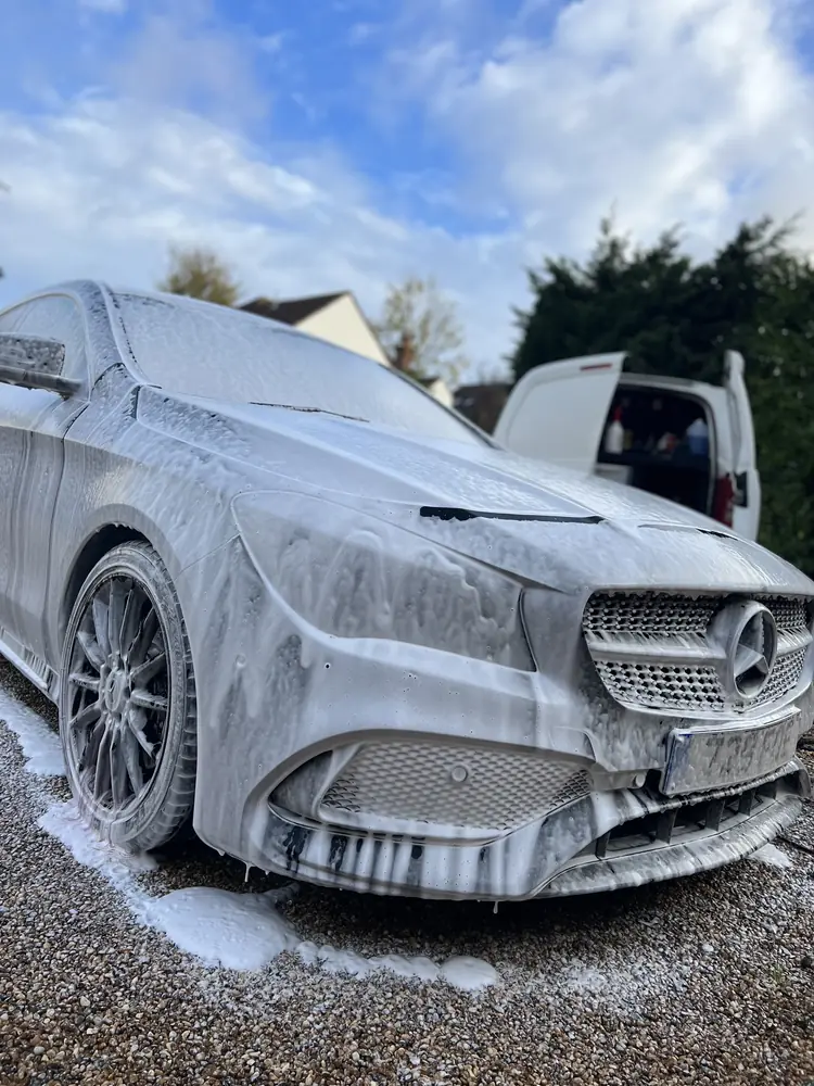 Mercedes covered in snow foam during a safe pre-wash