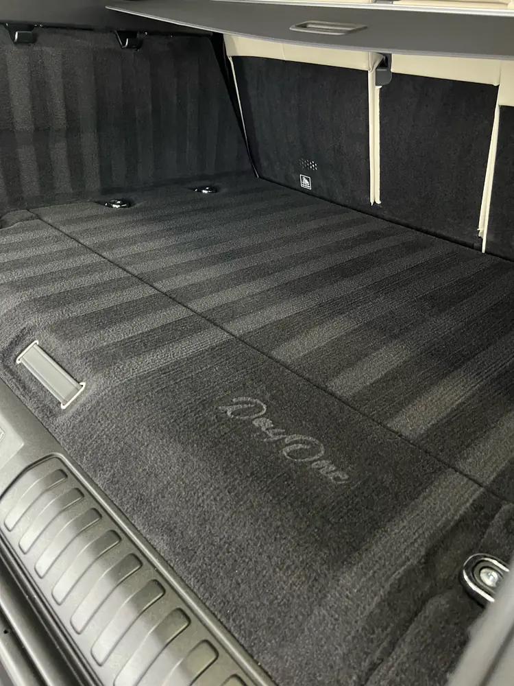 Boot carpet deep cleaned and dressed with a Day One Detailing embroidered mat