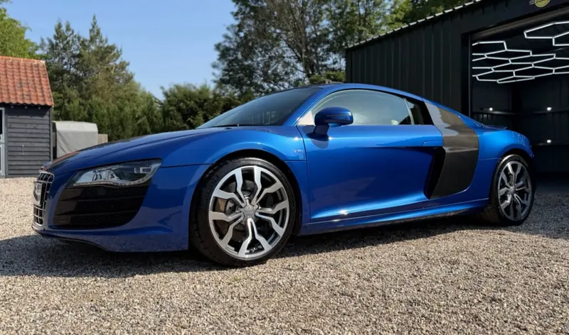 Blue first-generation Audi R8 with carbon side blades after detailing